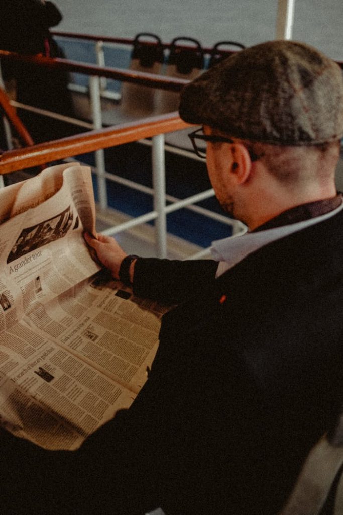 Man Reading Newspaper